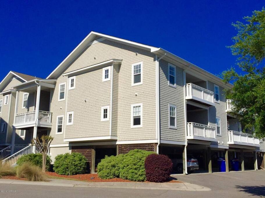 Apt F is top floor, corner; and parking is underneath.