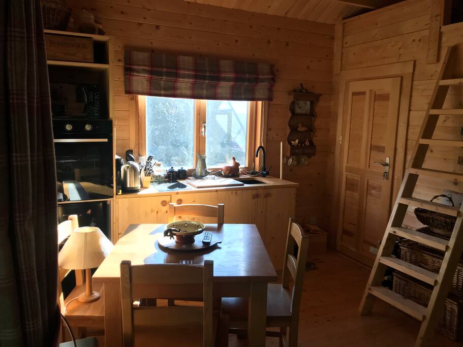 Fully equipped kitchen area with fridge, microwave, toaster, oven etc.