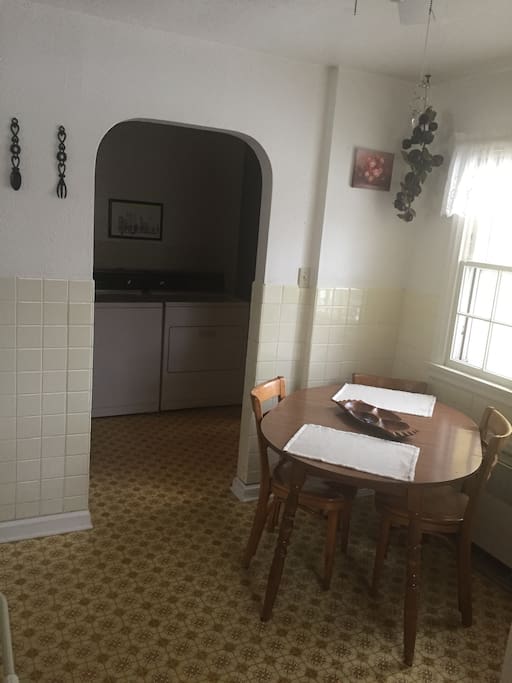 Washer and dryer off of kitchen area