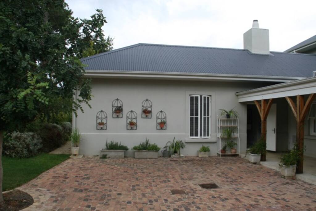 Private onsite parking with motorized driveway gate
