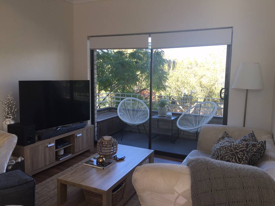 Light filled lounge room, TV with Netflix, Foxtel and Stan.