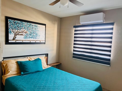 Duplex house with shared pool and tiny house