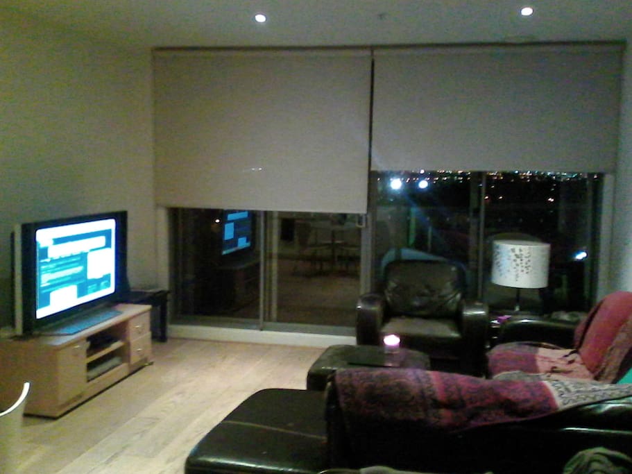 50" with Netflix and comfy couch don't be afraid to put your feet up and relax, on a rainy melbourne night.