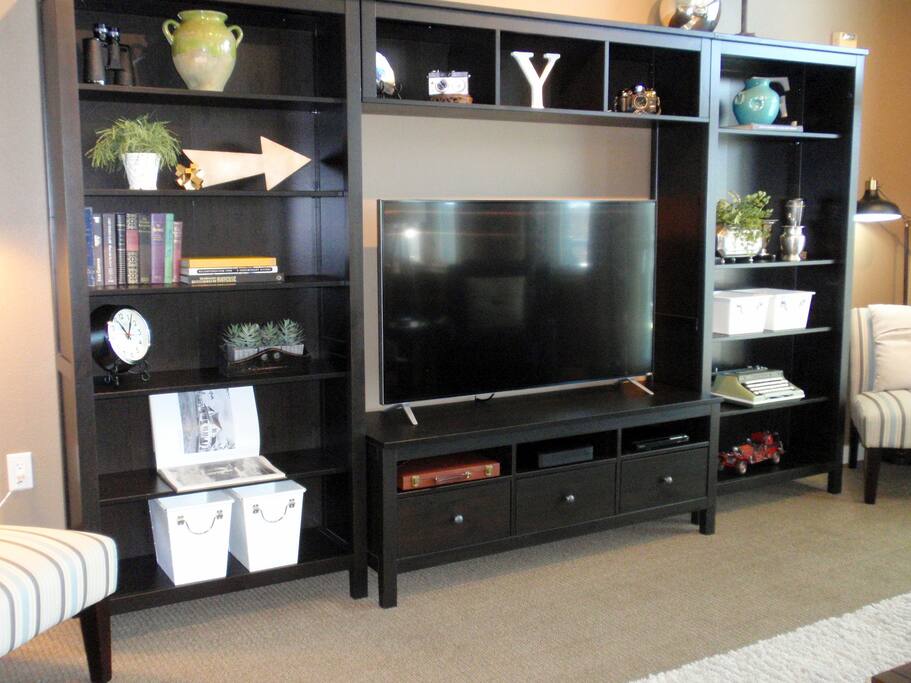 55" TV, DVD player, cable TV