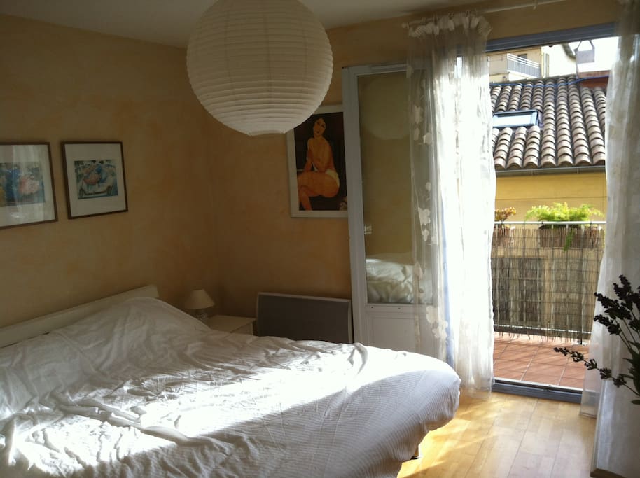 The Bedroom looking out to the balcony