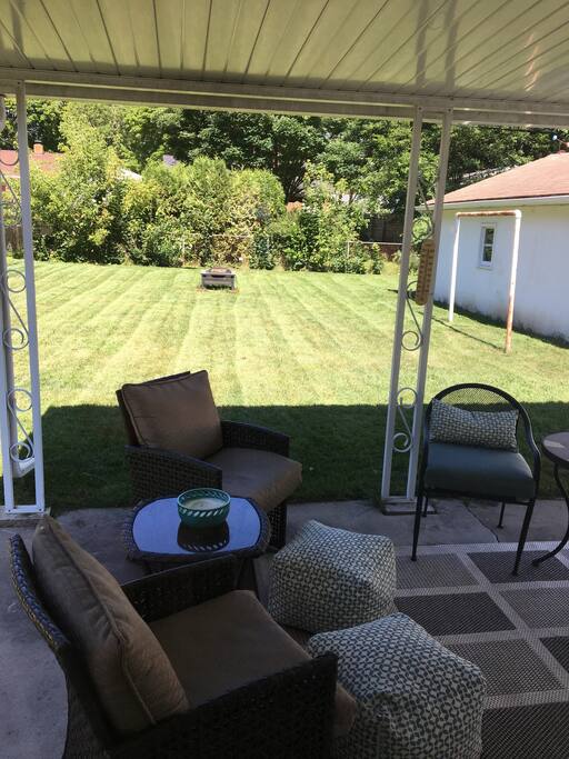 Patio door access to sitting area overlooking large (mostly private) back yard. Fire pit in back is useable. (Renters must supply own firewood)