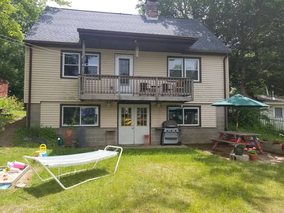 Back yard. Gas & charcoal grills. Outdoor speakers from your phone. Next pic inside doors to left.