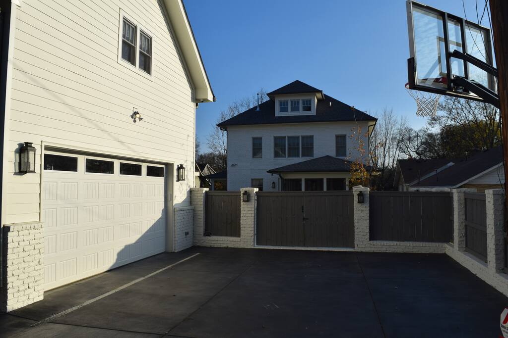 Garage and parking viewed from alley