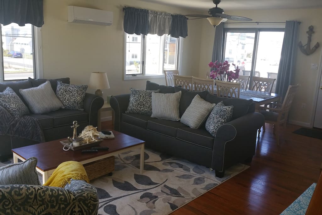 Living Room w/ Open Concept and Bay View