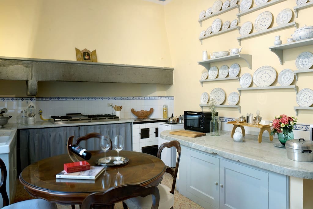 Large kitchen with an antique Carrara white marble countertop