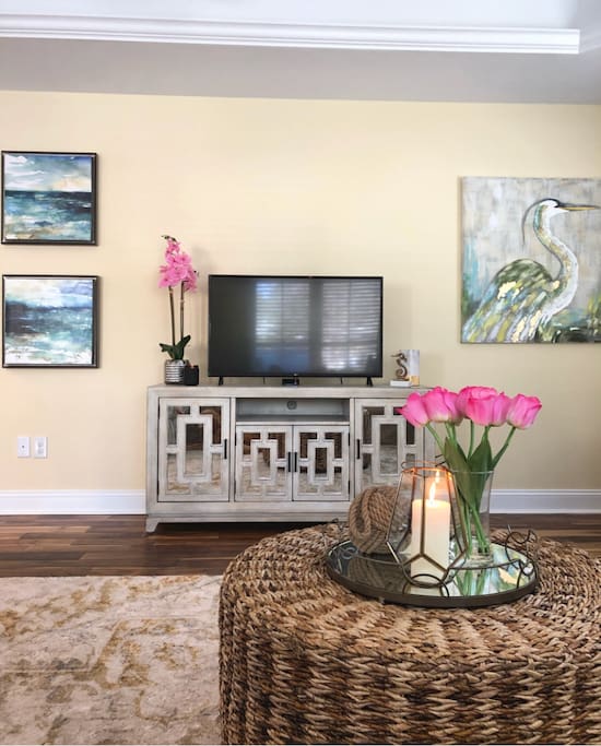 The living room is warm and inviting offering you a chance to relax and unwind in style.