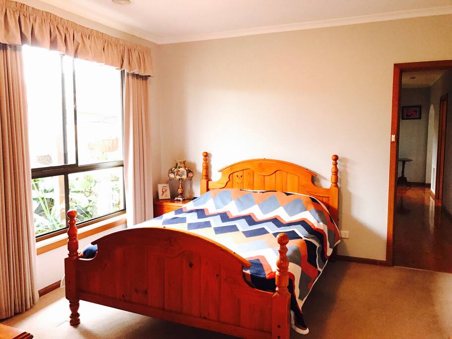 Master Bedroom with queen size bed and huge built-in wardrobe