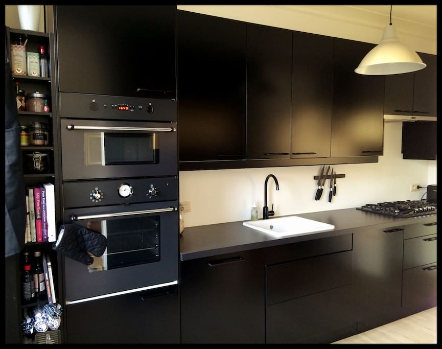 kitchen w oven, microwave, dishwasher, 5pit gas stove, fridge