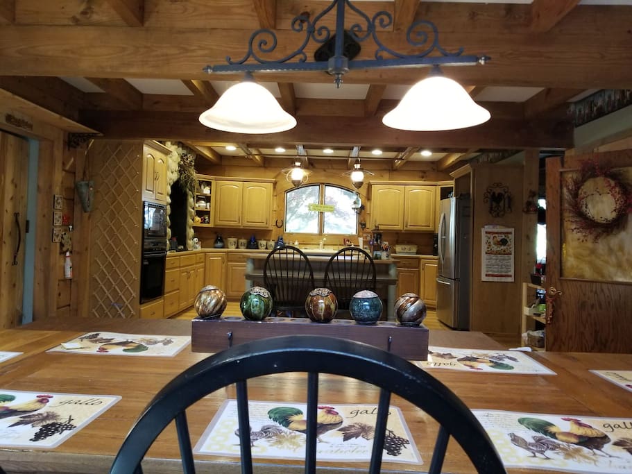 Large 17x32 eat in kitchen may be shared with others. Seats up to 10 at main table and 6 more with extra table under island.