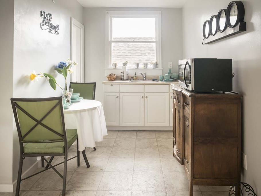 Dining area with microwave and sink
