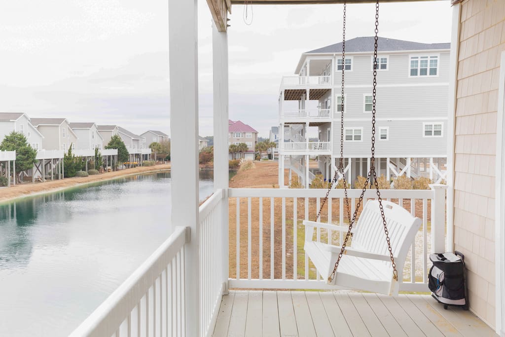 Porch swing on the spacious back balcony.