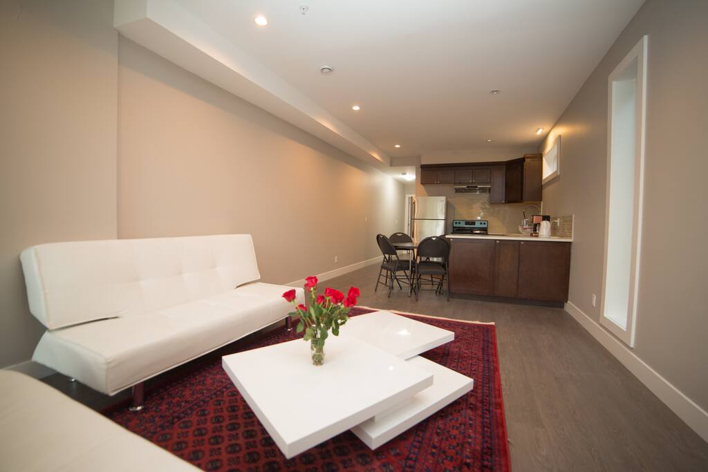 Spacious living room and open kitchen.