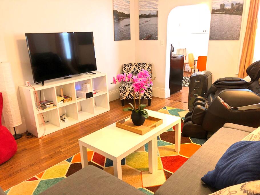 living room, with pull out couch (full size) and the massage chair