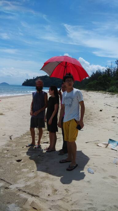With guests at the beach