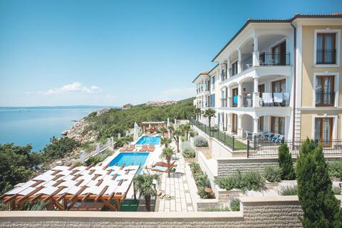 Three-Bedroom Apartment with shared swimming pool