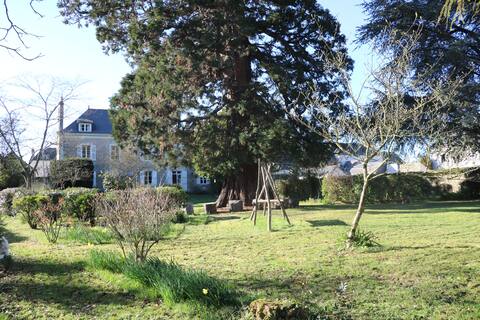 House with large garden in the heart of the village