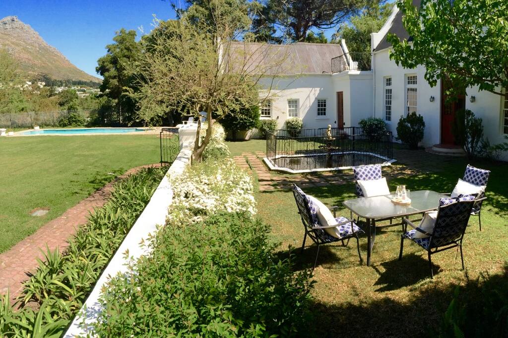 Tons of space to relax. Lawn, pool and courtyard on the river side of the house.