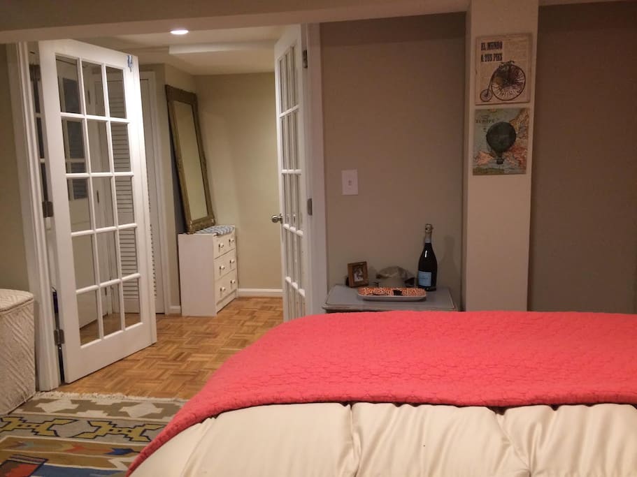 Beautiful french doors open up to private sitting room and bathroom