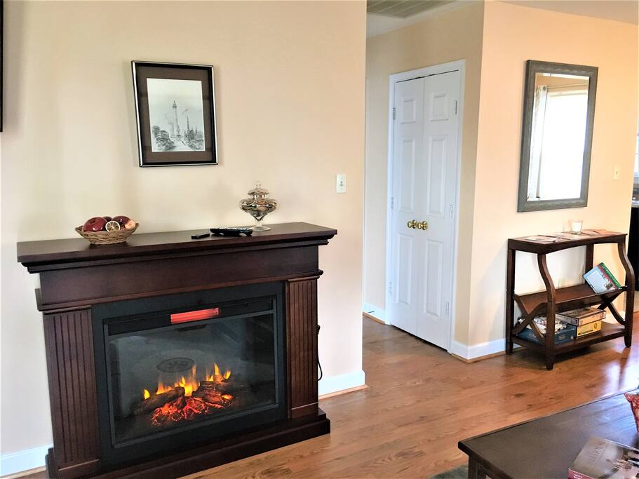 Fireplace across from couch.
