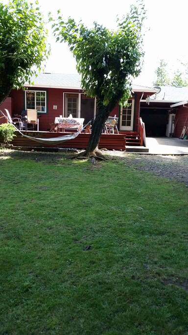 Deck off the master bedroom with barbecue and sitting area