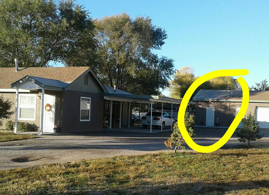 The studio sits next to our house on the property.