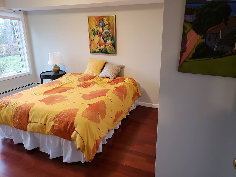 Private bedroom with bay views. Large double door closet with shelfs for clothes.