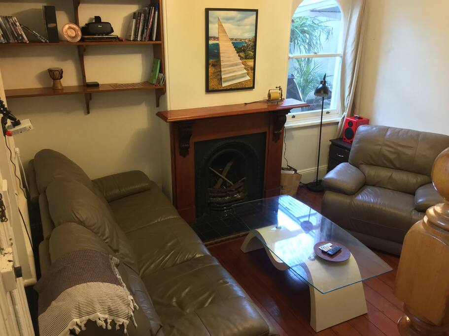 Reclining leather lounges and open fire