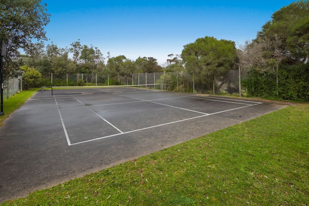 Shared Tennis Court & Basketball Ring