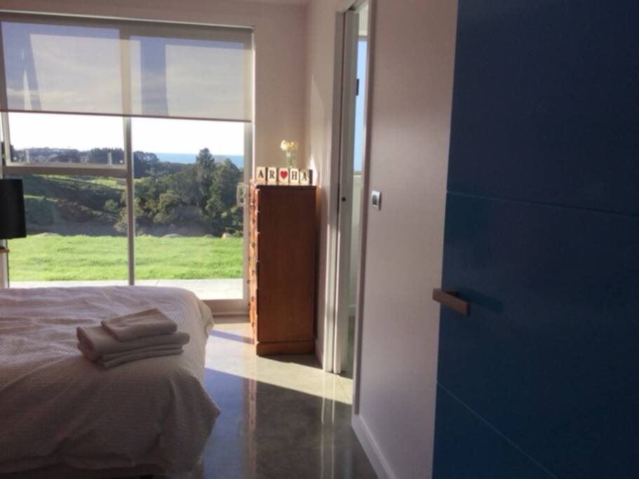 Room with a distant sea view