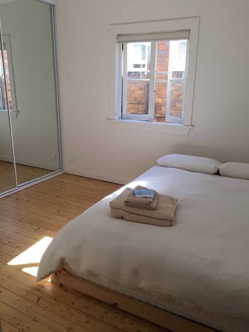 Large main bedroom with built in wardrobe