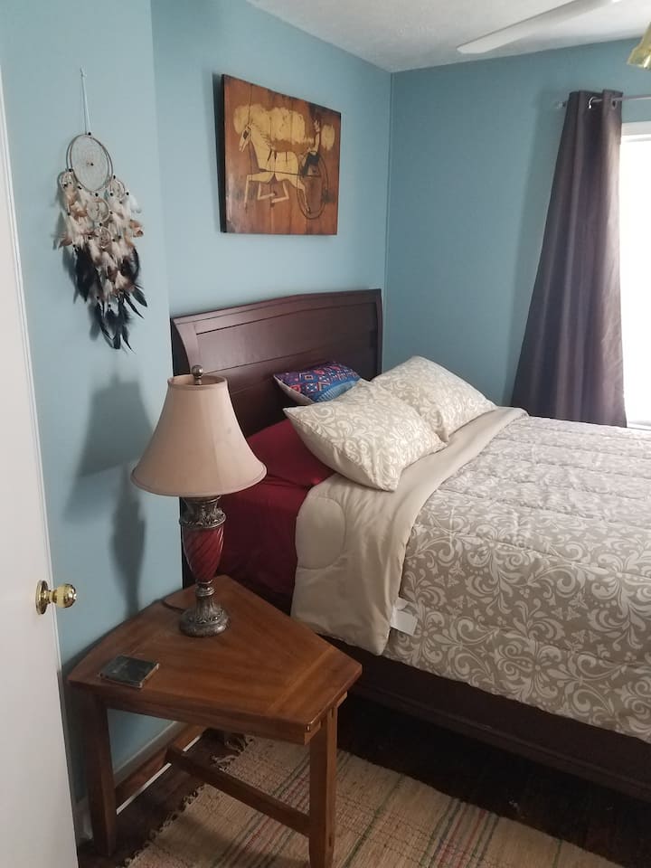 The Franklin room featuring a Folio 21 bed, Lane night table and accents from around the world.