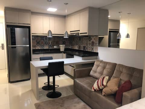 Top Airbnb: NEW STUDIO LOCATED IN FRONT OF SHOPPING CURITIBA em Centro