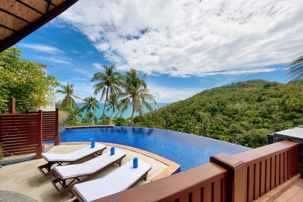 communal swimming pool with stunning sea view