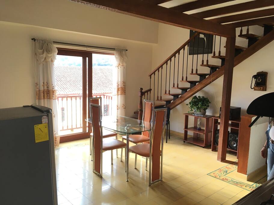 Family Room with Balcony and view of Church