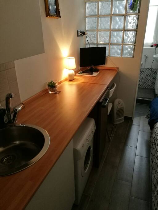Detail of desk/relax area. A washing machine is also available for lons stays!
