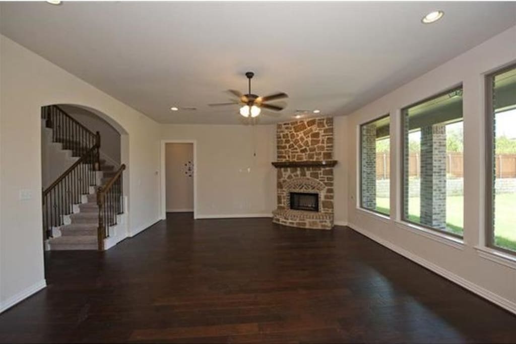 Couches and TV included but not pictured.