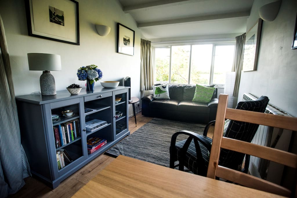 Comfortable Sitting Room with views over private deck & Garden