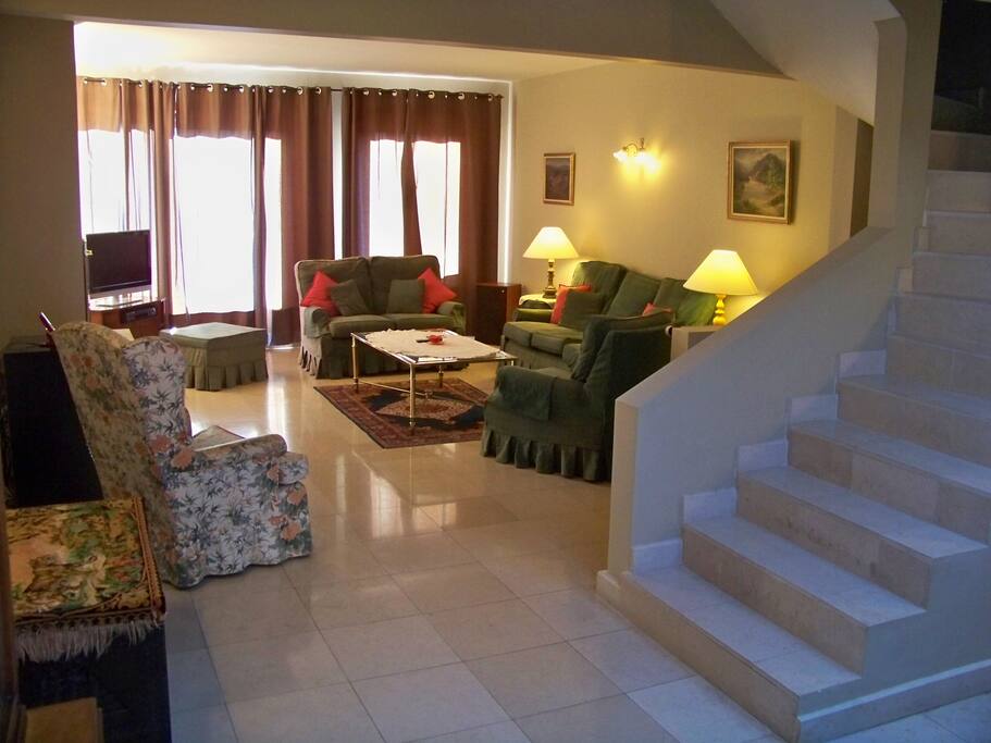 Living area showing stairs to roof garden
