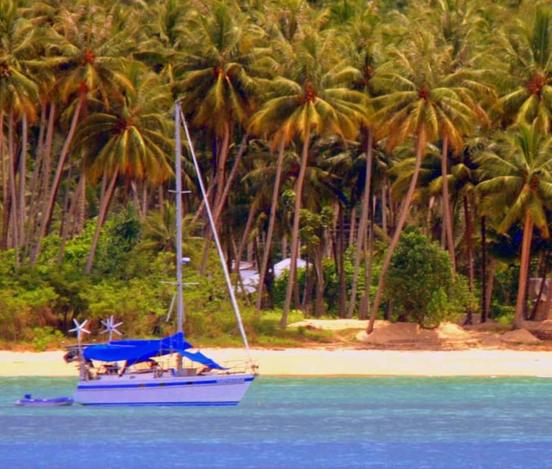 Surfmachine at anchor in Lagundri Bay on the island of Nias on the west coast of Sumatra in the Indian Ocean.