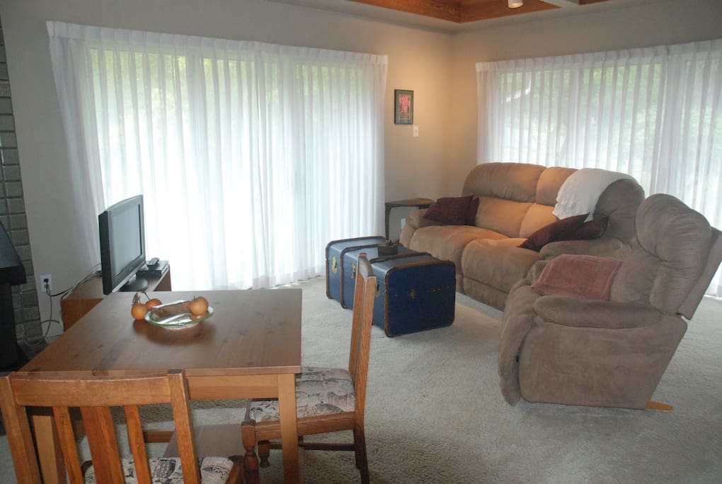 Living area with reclining couch and chair