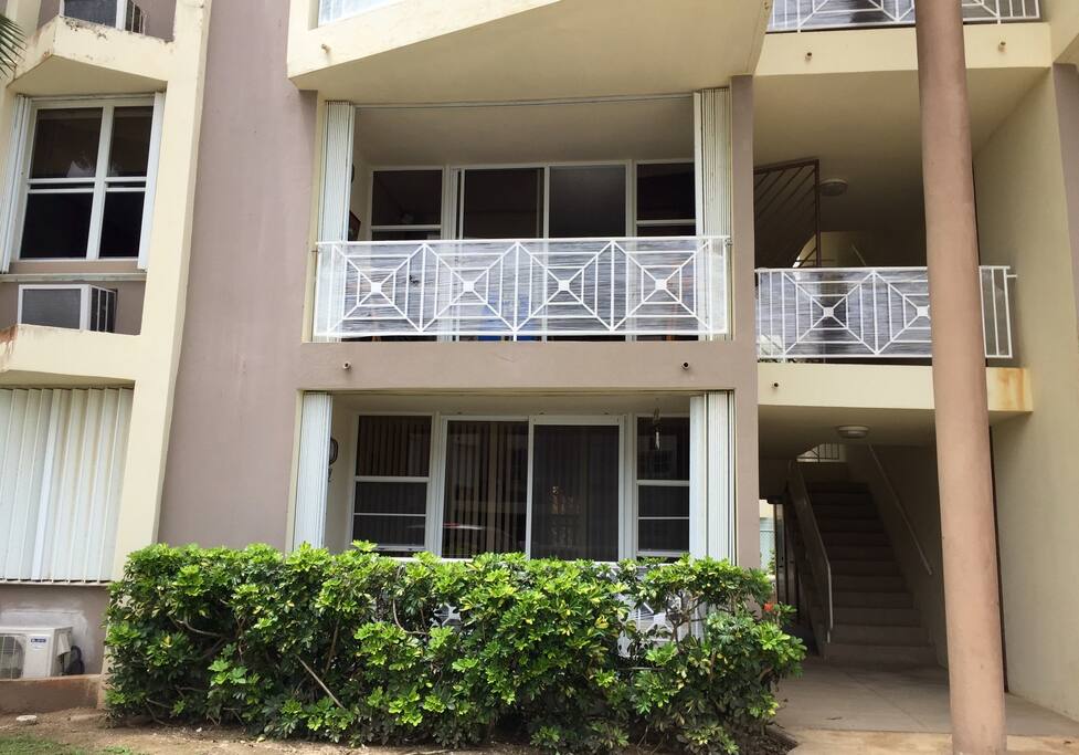 Front view of the apartment ((It's on the second floor – There's no elevator* but it's less than 15 steps)). The plastic wrapping around the hand rails is there because they are new.