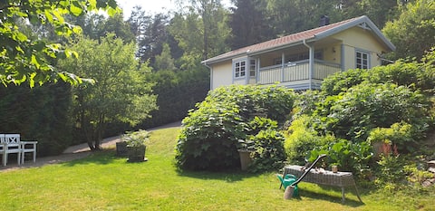 Nice house with fireplace in the middle of nature