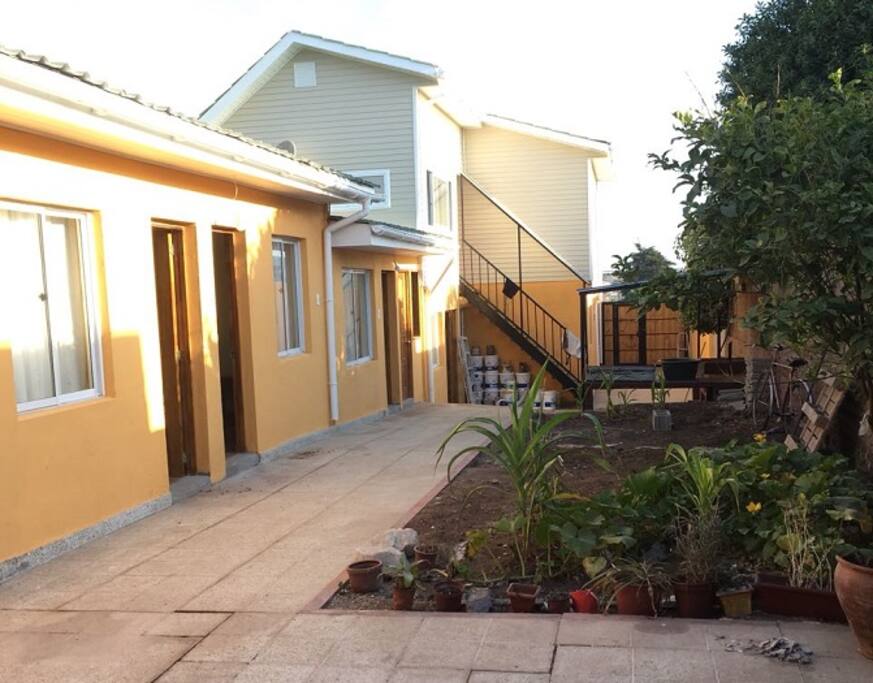 Vista habitaciones, quincho y salón