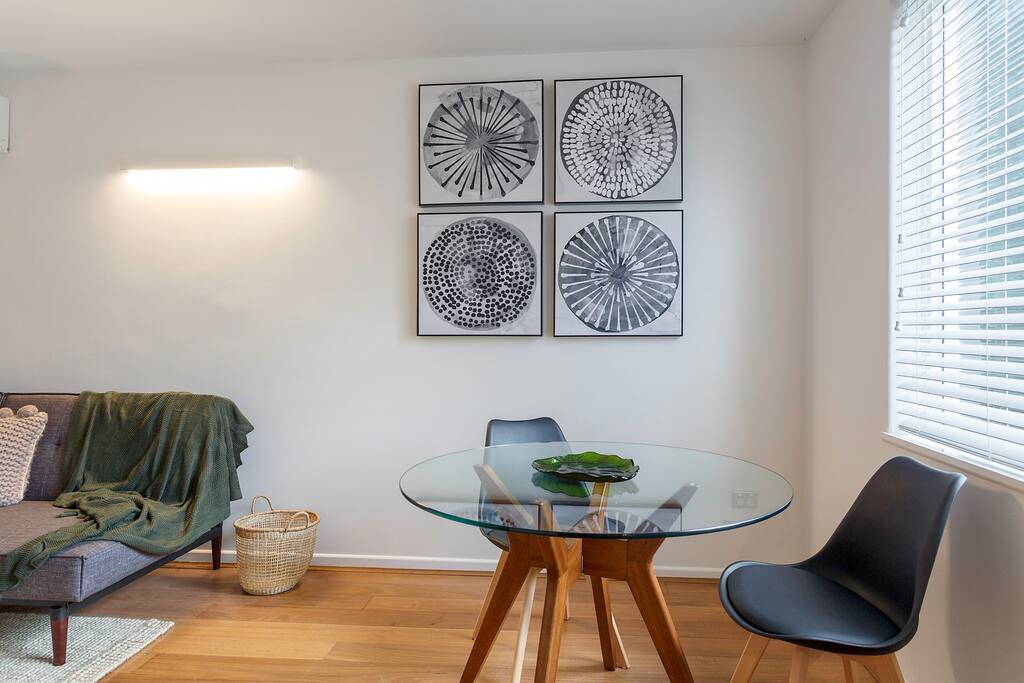 Relax around the dining table- eat a meal, read a book, play cards, enjoy the light flooding in during the day.