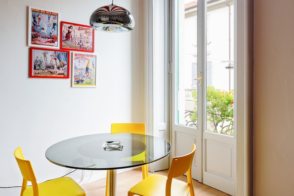 The living room: the dining table & the balcony